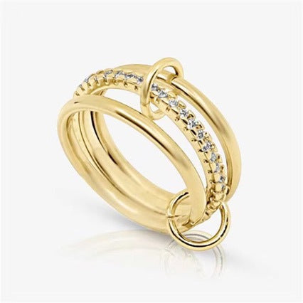 Three Interlocking Zircon Rings Stacked Together For A Layered Look