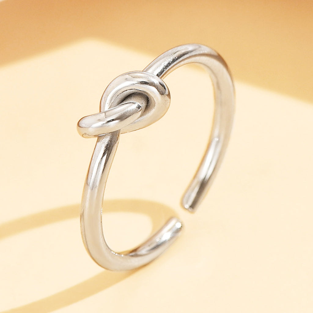 Stainless Steel Ring With A Braided Cord And Adjustable Opening