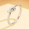 Stainless Steel Ring With A Braided Cord And Adjustable Opening