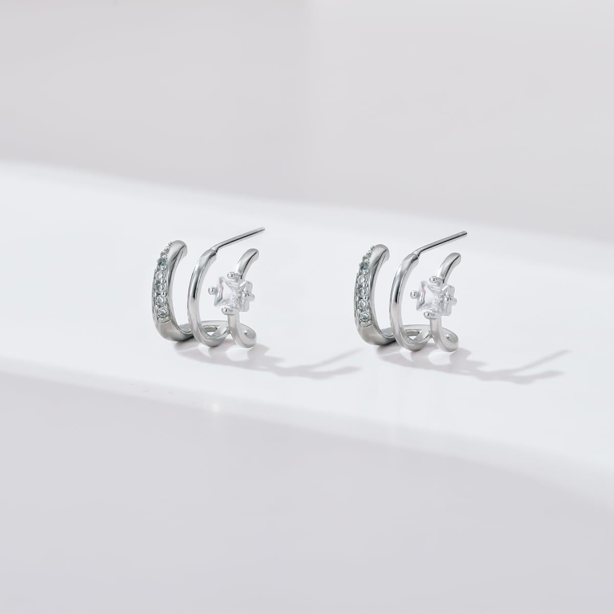 Fashionable Three-prong Curved Diamond Stud Earrings
