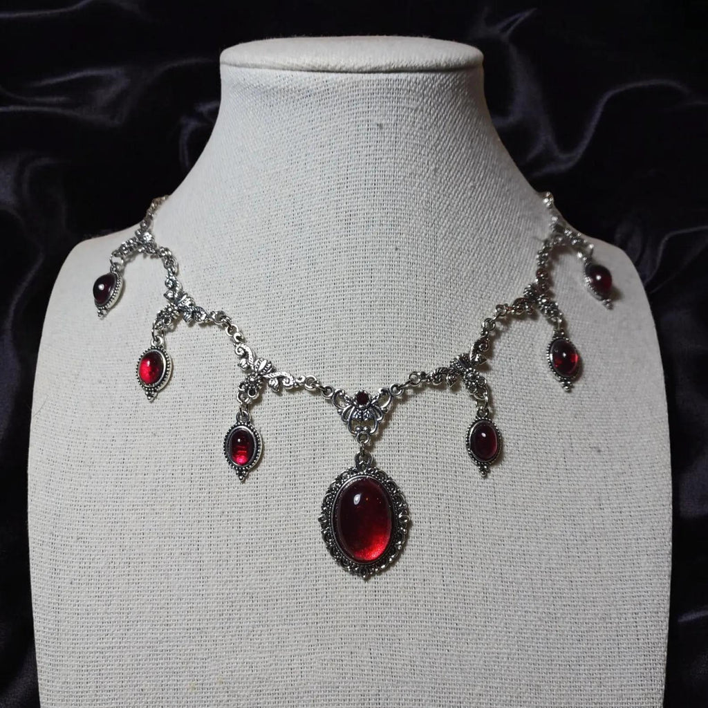 Vintage-style Red Crystal Gem In A Regal Courtly Aesthetic