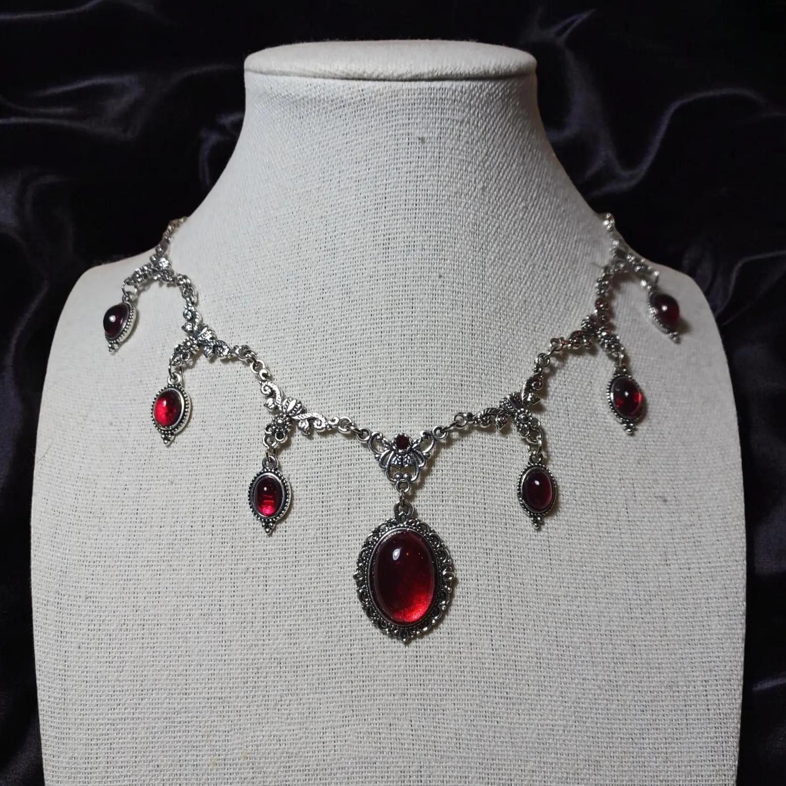 Vintage-style Red Crystal Gem In A Regal Courtly Aesthetic