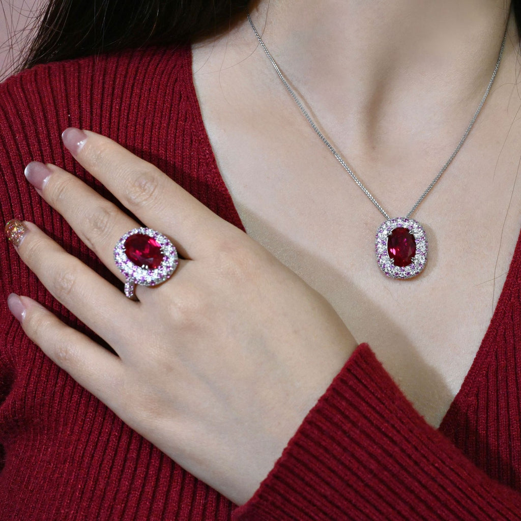 Ruby And Diamond-studded Oval Ring With A Pigeons-egg-shaped Center Stone