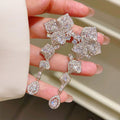 Elegant Slender Zircon Flower Earrings That Exude A Refined Sense Of Style