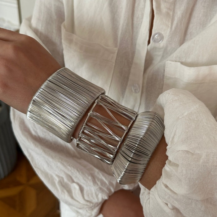 Bold Exaggerated C-shaped Alloy Bracelet With A Brushed Finish