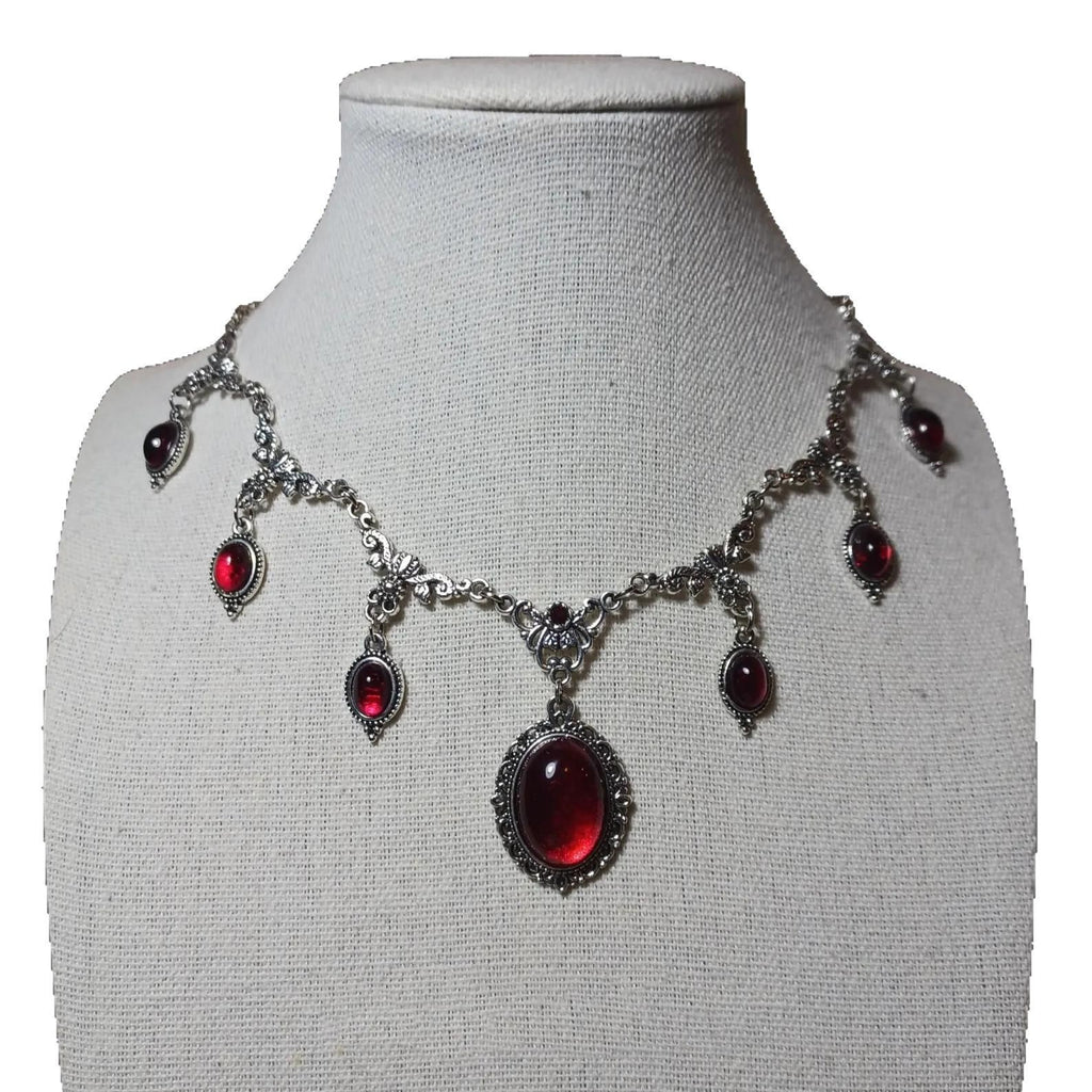 Vintage-style Red Crystal Gem In A Regal Courtly Aesthetic