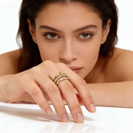 Three Interlocking Zircon Rings Stacked Together For A Layered Look