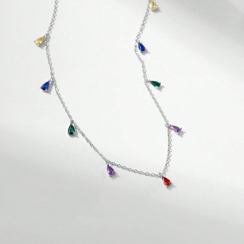 A Minimalist 925 Silver Necklace Featuring A Pendant With 9 Colorful Teardrop shaped Pendants