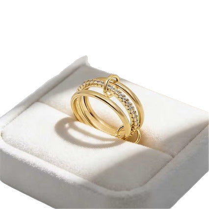 Three Interlocking Zircon Rings Stacked Together For A Layered Look