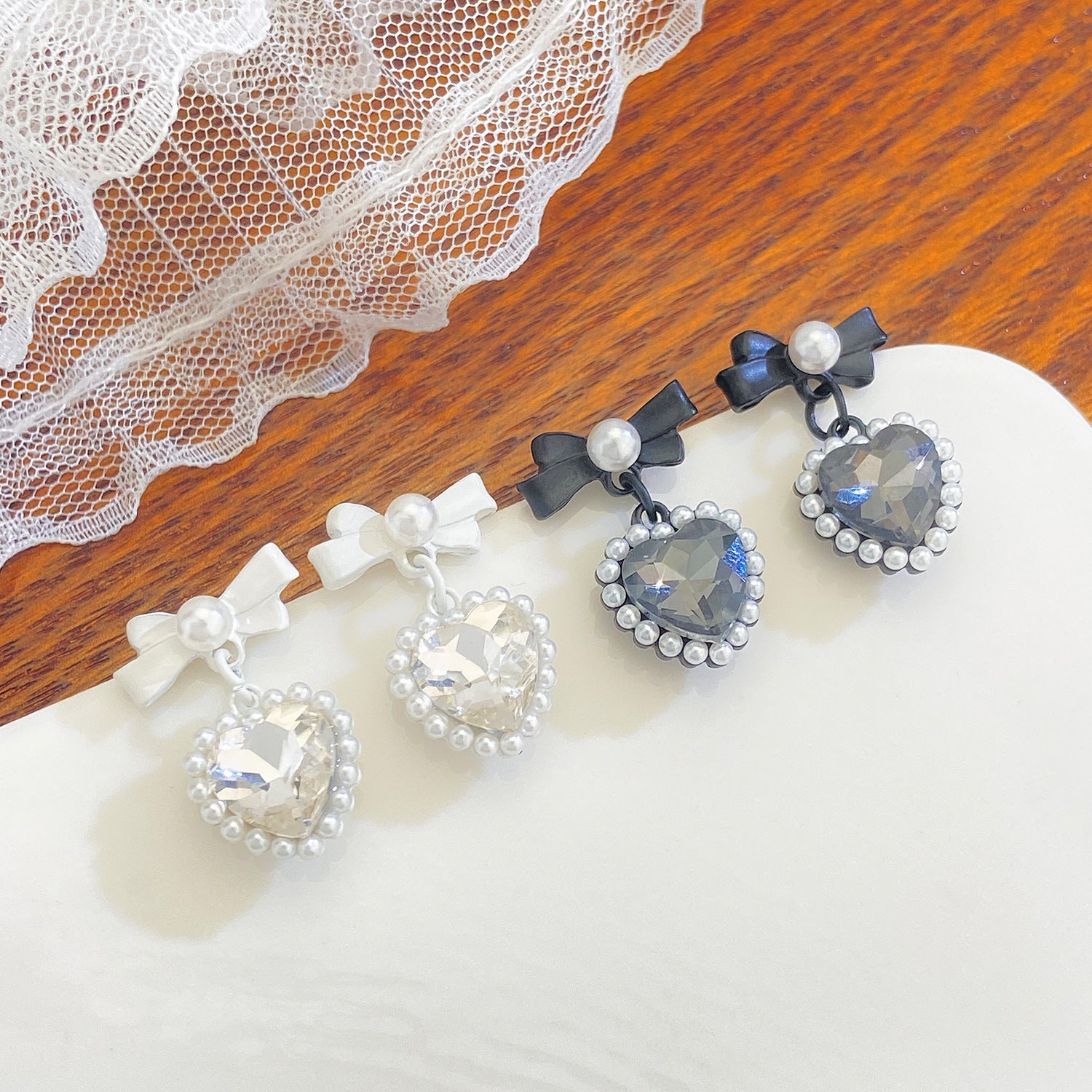 Light-luxury Pearl-embellished Bow Earrings