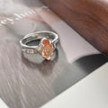 Olive Green Zircon Ring With An Irregular Textured Finish