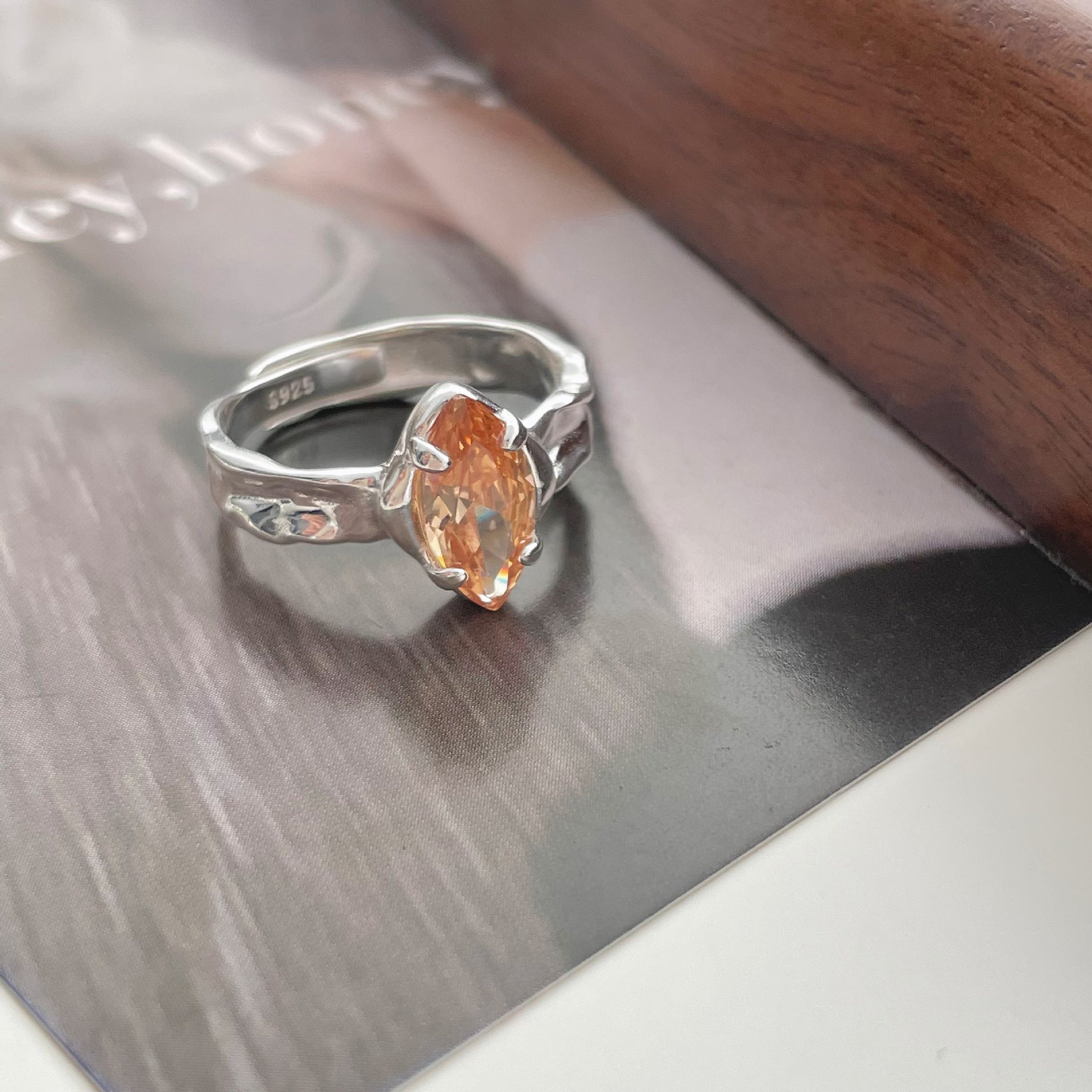 Olive Green Zircon Ring With An Irregular Textured Finish