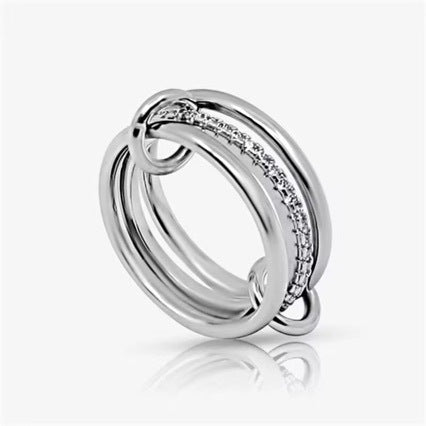Three Interlocking Zircon Rings Stacked Together For A Layered Look