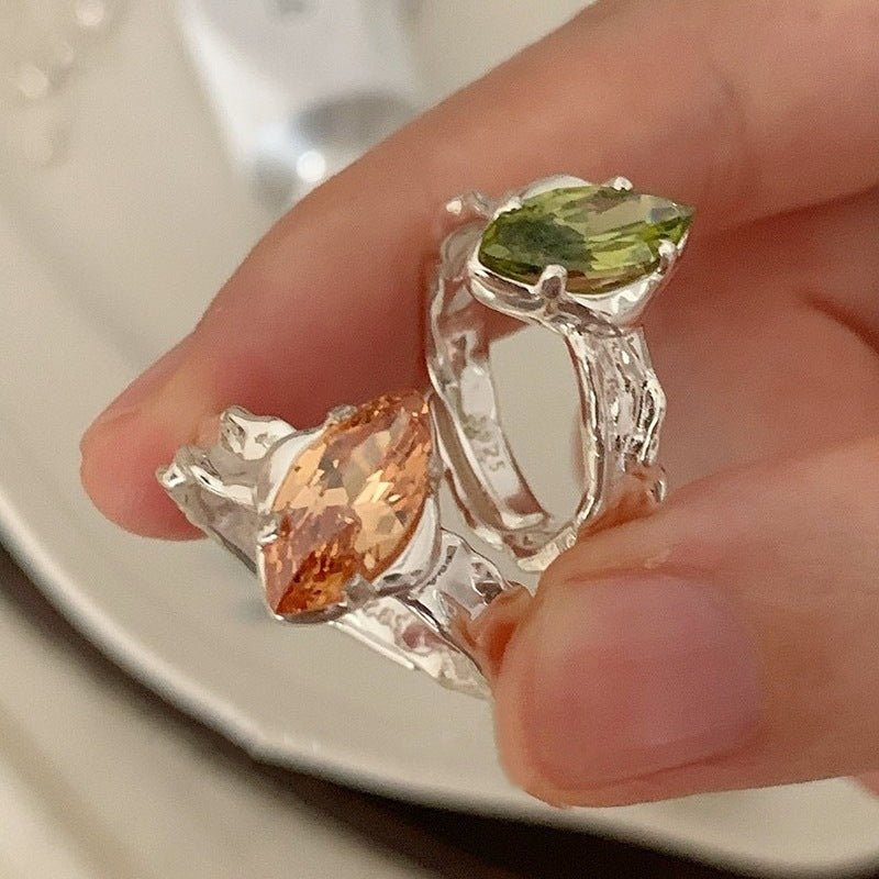 Olive Green Zircon Ring With An Irregular Textured Finish