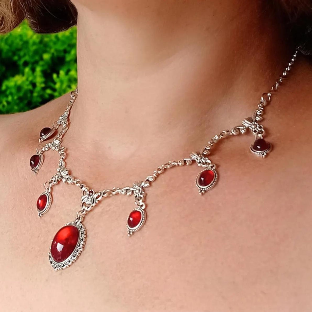 Vintage-style Red Crystal Gem In A Regal Courtly Aesthetic