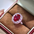 Ruby And Diamond-studded Oval Ring With A Pigeons-egg-shaped Center Stone