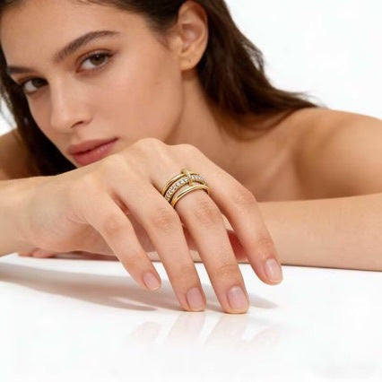 Three Interlocking Zircon Rings Stacked Together For A Layered Look