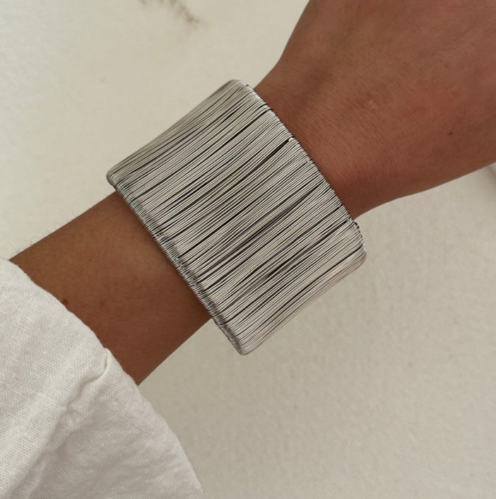 Bold Exaggerated C-shaped Alloy Bracelet With A Brushed Finish