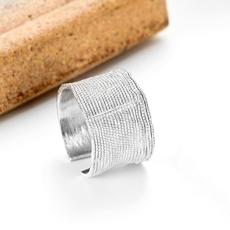 Irregularly Textured Wide-faced Open Ring