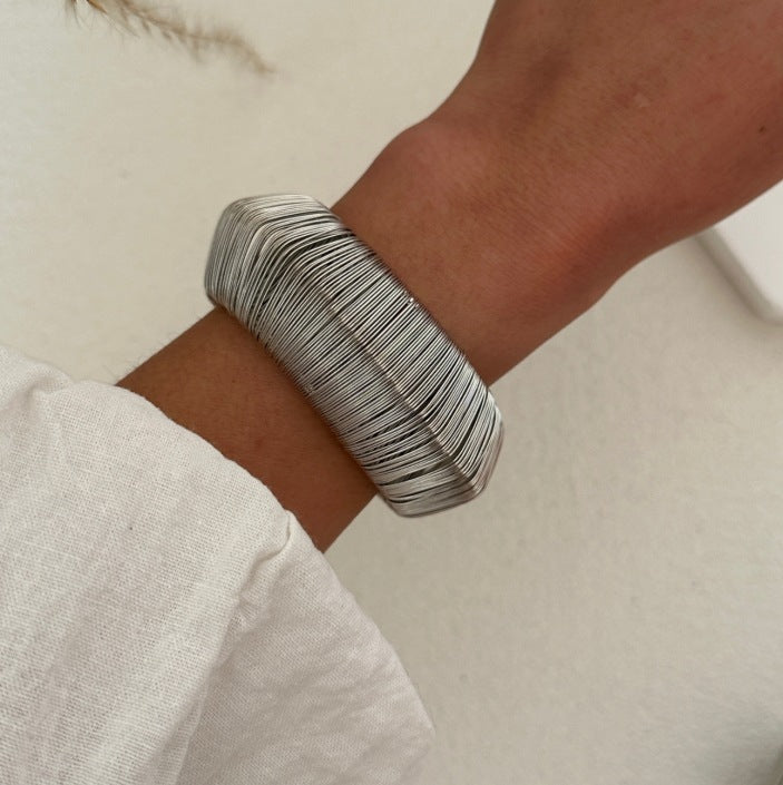 Bold Exaggerated C-shaped Alloy Bracelet With A Brushed Finish