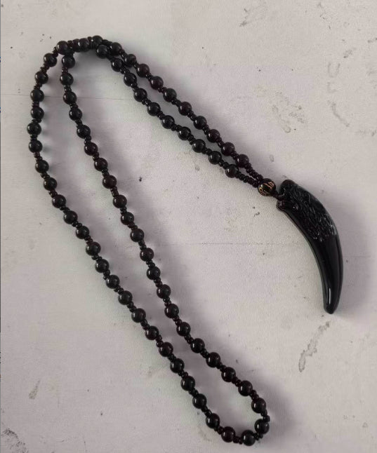 Simulated Obsidian Glass Wolf Tooth Pendant Necklace